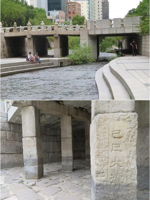 復元された広通橋(左側部分)。歩道上にあるため、橋脚、橋桁に施された装飾、文字などが見られるようになっている