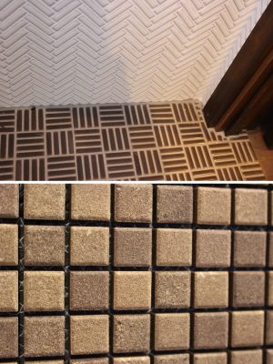 写真上/角の部分など、DIYに慣れない初心者が自らモザイクタイルを施工するには難しさが。ちなみに、写真の白いモザイクタイルと茶色のモザイクタイルは色違いだけで、大きさは同じ。置き方による模様で印象を変えられる。写真下/目地を入れていない状態のモザイクタイル。接着剤が多すぎると目地部分が詰まってしまい、目地材を入れる前に削らなければいけないことも。いずれの作業工程にも細心の注意が必要になる