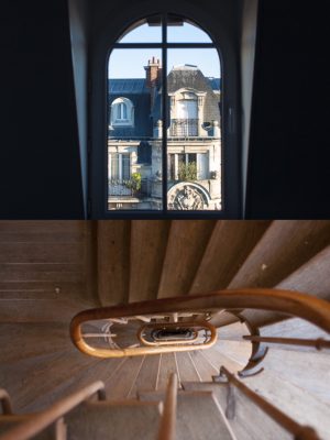 chambre de bonneの窓に差し込む街の光と、足腰を鍛えられる8階までの螺旋階段（撮影：chikara）