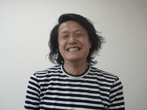 アメリカ村の会　会長の四月朔日（わたぬき）　幸平さん