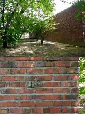 （上）展示室棟の外壁（下）レンガ外壁のクローズアップ。焦げた部分も活かしている