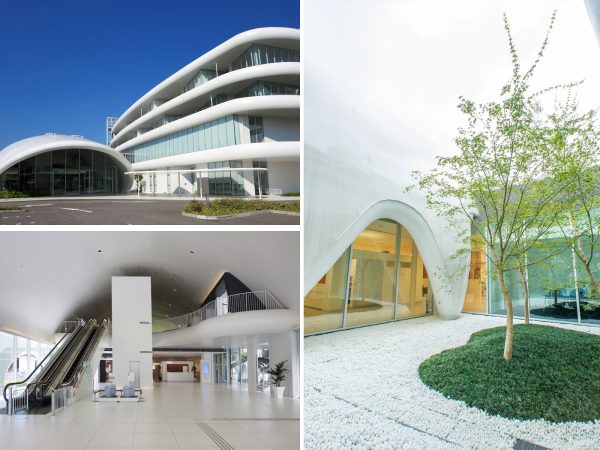 左上：ひときわ目立つ外観。滑らかな三次曲線による「緑豊かな大地」と「水滴」をイメージ<br>
左下：壁面は衛生陶器をイメージさせる白色で統一。あちこちになめらかな曲線が見える<br>
右：衛生陶器を作る際に使った「アルミナ玉石」を中庭の玉砂利として再利用 