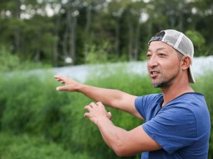 農地を案内してくれた押谷行彦さん