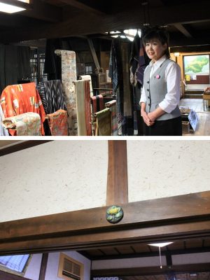 お話をうかがった一般財団法人松崎町振興公社の佐藤尚子さん（上）。釘隠しには、家紋の橘をあしらった貴重な焼物がつかわれている（下）