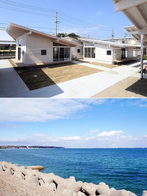 信号を西に渡れば中学校、東に100ｍで海というロケーションに建つ。団地内の通路は1.8ｍと比較的幅広で、ベビーカーや車椅子に配慮した造りになっている