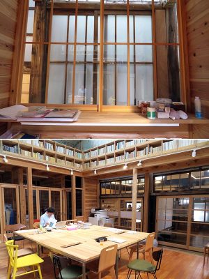 上／壁側に作られた個室から外を見ると内側、外側に2つの窓があり、入れ子になっていることが分かる。下／真ん中のテーブルを囲む、新しい木の部分が建物を支えている