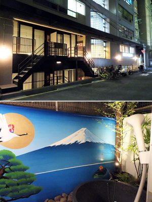 オフィスビルの1階、2階を外から入れるように改装したゲストハウス。4室のうち、1室にはドライエリアを利用した露天風呂が設けられている