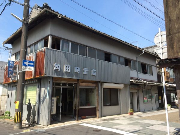 DOCRE結成後間もなくのふたり。市での仕事用の作業着で写した一枚