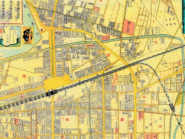 敗戦直後の立川。お店の多さから繁栄ぶりが想像される。左隅の歯科医院の広告のあたりがGREEN SPRINGS。真ん中右側、南武線のカーブの下にカフェー喫茶料理商業協同組合の文字、南武線の右に田の字型の一角があり羽衣町喫茶総合事務所という文字が見えるのがそれぞれかつての遊廓。戦後一時期は米兵も来る赤線だった。
資料：『立川商工地図』1949年
