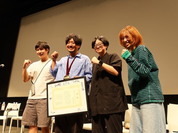 佐々木氏の展示。例に挙げていただいたホテルは中央右にあるもの。それ以外では海辺の公園に建つ、公園でもあり、ホテルのテラスでもある空間を持ったホテルや塀を取り込んだ建物など興味深い建築が並んでいた