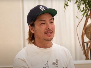 ▲エネシフ湖北・代表の清水氏。エネシフ湖北では、若い世代が地域エネルギーに触れる機会や情報を発信。先日は高校の教室に断熱材を入れるワークショップを行ったそう